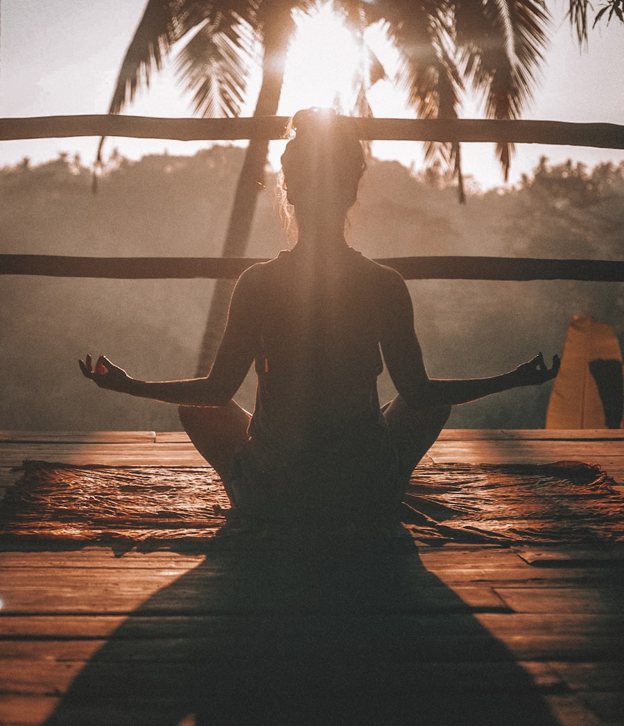 Founder practising meditation in warm coastal light